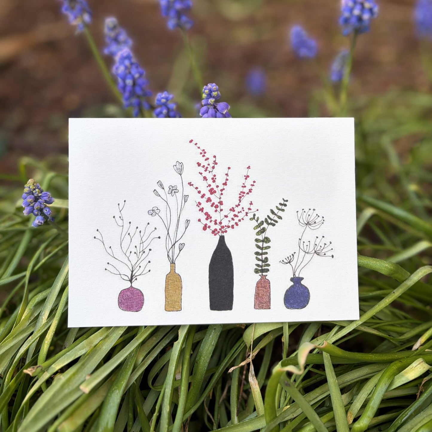 Emma Nieke Greeting Card - flesjes bloemen